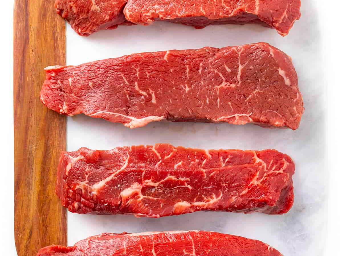 Raw sirloin tip steak from local farm raised cattle