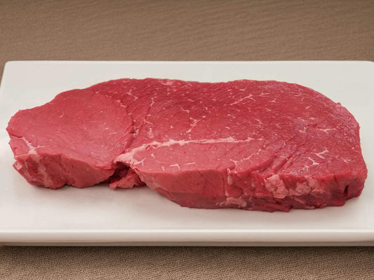 Raw top round London broil from local farm raised cattle